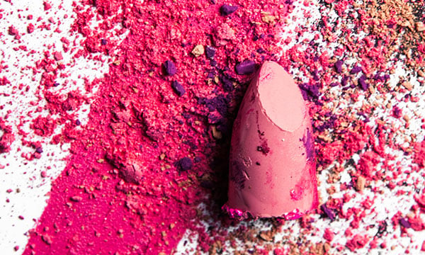 Lipstick on a canvas of make up