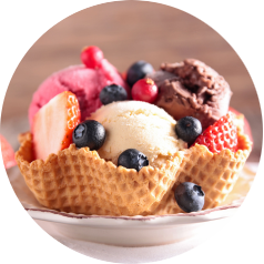 Ice cream in a wafer bowl with fruit