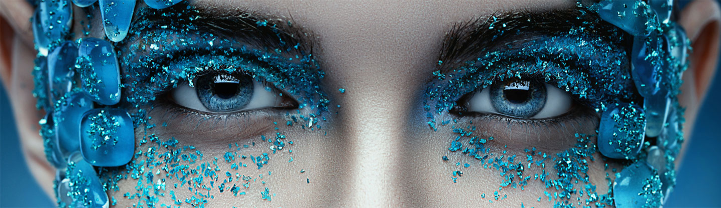 Blue eyes with theatrical makeup