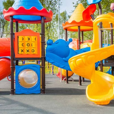 Colorful childrens playground created with sustainable rubber and plastic additives